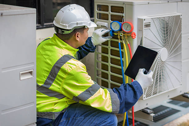 Professional Ductwork Repair technician working in Ames, TX